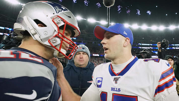 Former New England Patriots quarterback Tom Brady (12) and Buffalo Bills quarterback Josh Allen (17).
