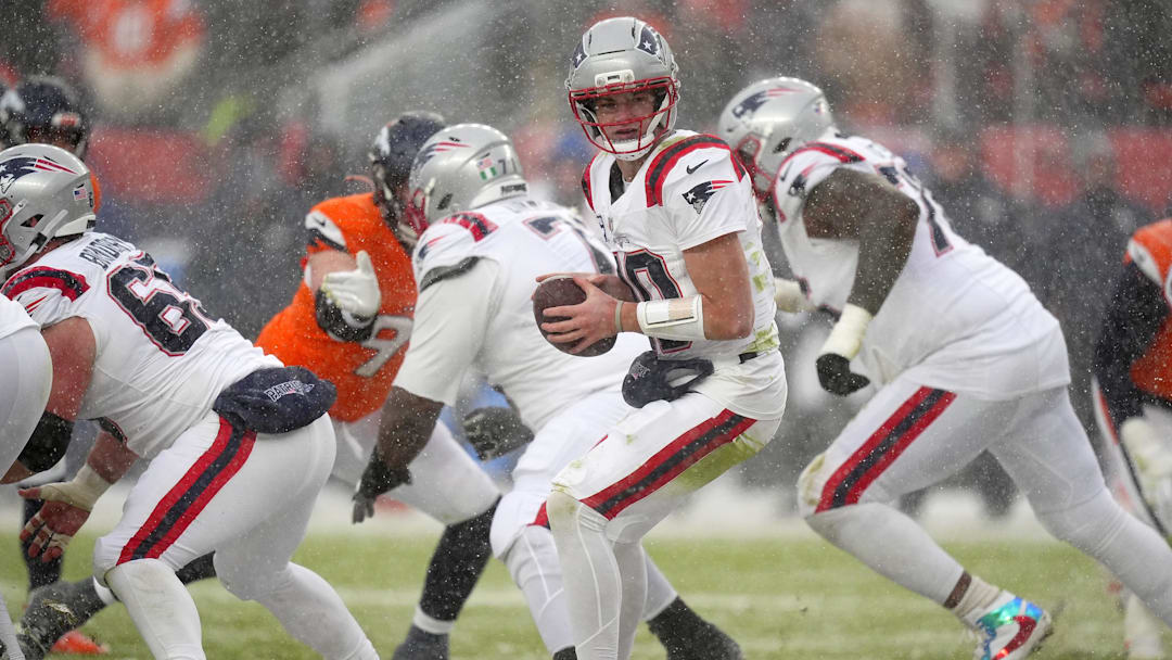Jan 25, 2026; Denver, CO, USA; New England Patriots quarterback Drake Maye (10) drops back to pass against the Denver Broncos during the second half in the 2026 AFC Championship Game at Empower Field at Mile High. Mandatory Credit: Ron Chenoy-Imagn Images