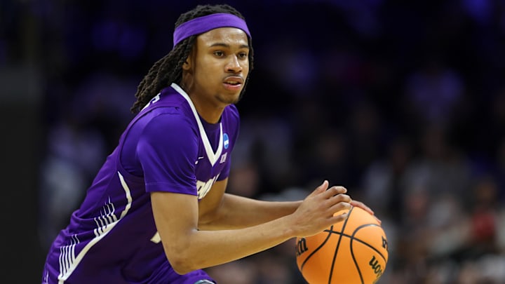 Mar 20, 2026; Philadelphia, PA, USA; Furman Paladins guard Alex Wilkins (10) dribbles the ball against the UConn Huskies in the second half during a first round game of the men's 2026 NCAA Tournament at Xfinity Mobile Arena. Mandatory Credit: Bill Streicher-Imagn Images