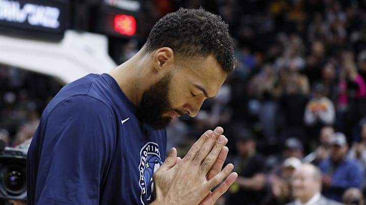 Dec 9, 2022; Salt Lake City, Utah, USA; Minnesota Timberwolves center Rudy Gobert (27) reacts to Utah Jazz fans welcoming him back prior to their game at Vivint Arena. Mandatory Credit: Jeffrey Swinger-Imagn Images Dec 9, 2022; Salt Lake City, Utah, USA; Minnesota Timberwolves center Rudy Gobert (27) reacts to Utah Jazz fans welcoming him back prior to their game at Vivint Arena. Mandatory Credit: Jeffrey Swinger-Imagn Images