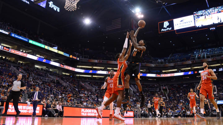 Apr 5, 2019; Phoenix, AZ, USA; Phoenix Suns guard Jamal Crawford (11) shoots against the New Orleans Pelicans during the first half at Talking Stick Resort Arena. 