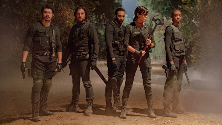 The Old Guard 2 (L-R) Henry Golding as Tuah, Luca Marinelli as Nicky, Marwan Kenzari as Joe, Charlize Theron as Andy and KiKi Layne as Nile in The Old Guard 2. Cr. Eli Joshua Ade/Netflix © 2025