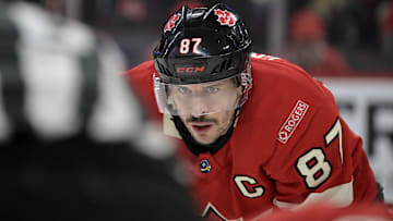 Feb 15, 2025; Montreal, Quebec, CAN; [Imagn Images direct customers only] Team Canada forward Sidney Crosby (87) prepares for a face-off against Team United States in the first period during a 4 Nations Face-Off ice hockey game at the Bell Centre. Mandatory Credit: Eric Bolte-Imagn Images