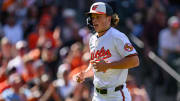 Apr 14, 2024; Baltimore, Maryland, USA; Baltimore Orioles second base Jackson Holliday (7) jogs to the dugout during the seventh inning against the Milwaukee Brewers at Oriole Park at Camden Yards