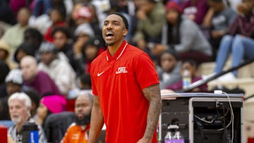 Pike High School head coach Jeff Teague reacts to action on the court during the first half of an IHSAA basketball game against Lawrence Central High School, Friday, Dec. 15, 2023, at Pike High School.