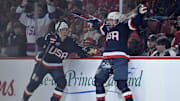Feb 15, 2025; Montreal, Quebec, CAN; [Imagn Images direct customers only] Team United States forward Dylan Larkin (21) celebrates after scoring a goal against Team Canada in the second period during a 4 Nations Face-Off ice hockey game at the Bell Centre. Mandatory Credit: Eric Bolte-Imagn Images