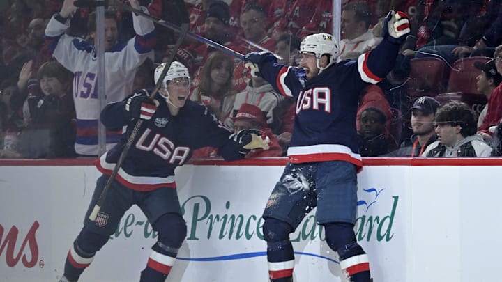 Feb 15, 2025; Montreal, Quebec, CAN; [Imagn Images direct customers only] Team United States forward Dylan Larkin (21) celebrates after scoring a goal against Team Canada in the second period during a 4 Nations Face-Off ice hockey game at the Bell Centre. Mandatory Credit: Eric Bolte-Imagn Images
