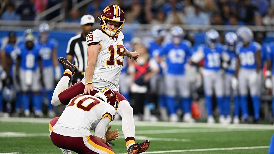 Aug 22, 2026; Detroit, Michigan, USA;  Washington Commanders placekicker Drew Stevens (19) kicks an extra point against the Detroit Lions in the first quarter at Ford Field.  Mandatory Credit: Lon Horwedel-Imagn Images