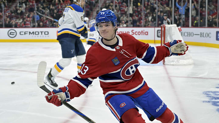 Oct 26, 2024; Montreal, Quebec, CAN; Montreal Canadiens forward Cole Caufield (13) celebrates after scoring a goal against the St.Louis Blues during the third period at the Bell Centre. Mandatory Credit: Eric Bolte-Imagn Images