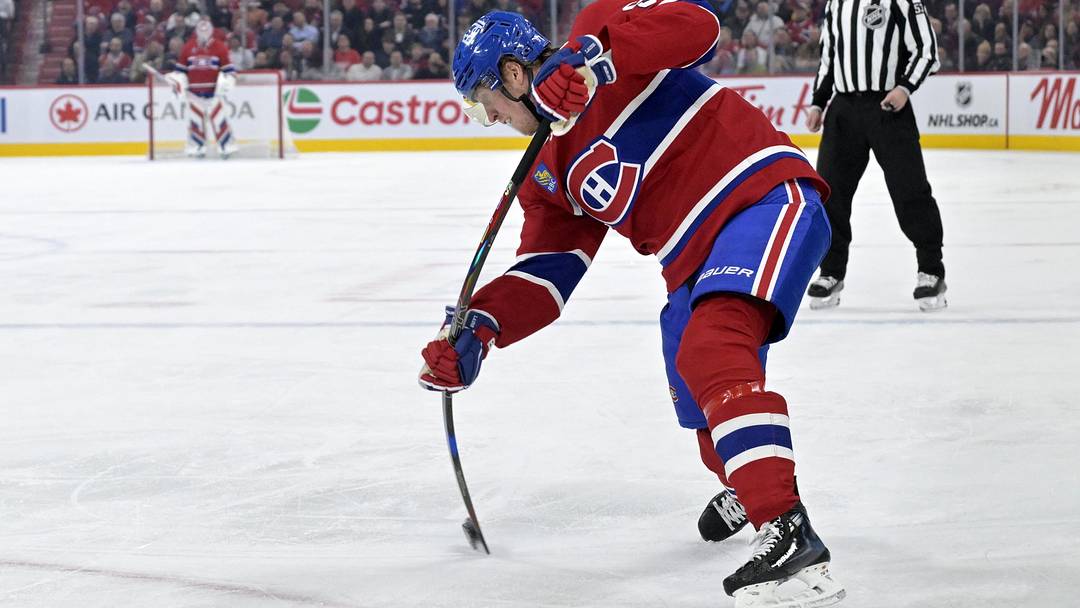 Apr 8, 2025; Montreal, Quebec, CAN; Montreal Canadiens forward Patrik Laine (92) takes a shot on net during the second period of the game against the Detroit Red Wings  at the Bell Centre. Mandatory Credit: Eric Bolte-Imagn Images