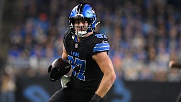 Sep 30, 2024; Detroit, Michigan, USA;  Detroit Lions tight end Sam LaPorta (87) runs upfield after catching a pass against the Seattle Seahawks in the second quarter at Ford Field. Mandatory Credit: Lon Horwedel-Imagn Images