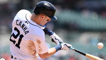 Jun 13, 2024; Detroit, Michigan, USA;  Detroit Tigers first baseman Mark Canha (21) hits an RBI single against the Washington Nationals in the third inning at Comerica Park