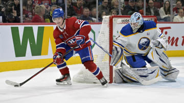 Feb 21, 2024; Montreal, Quebec, CAN; Montreal Canadiens forward Cole Caufield (22) plays the puck