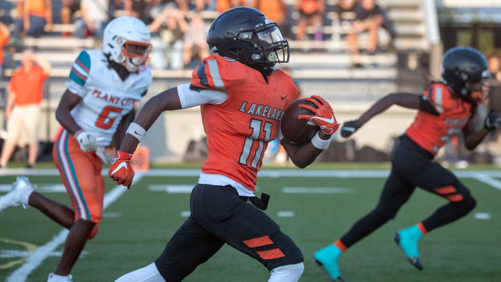 Lakeland running back Alashawn Haggins runs for a 67-yard touchdown against Plant City.