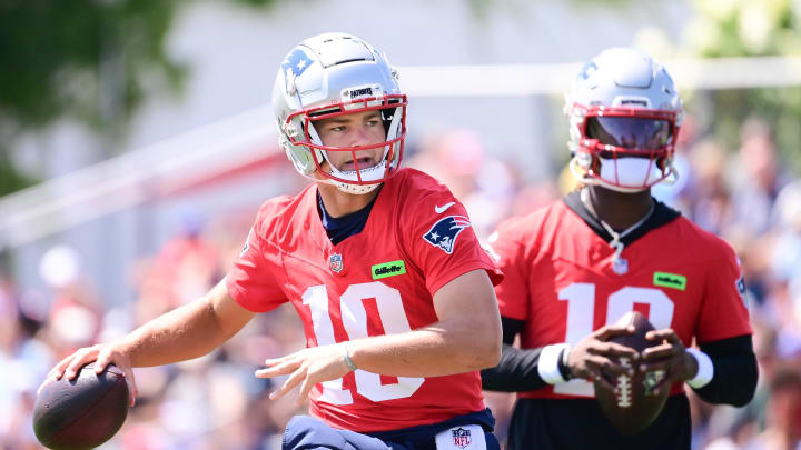 Jul 26, 2024; Foxborough, MA, USA; New England Patriots quarterback Drake Maye (10) throws a pass during training camp at Gillette Stadium. Mandatory Credit: Eric Canha-USA TODAY Sports