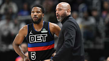 Jan 11, 2025; Detroit, Michigan, USA;  Detroit Pistons head coach J.B. Bickerstaff talks with guard Malik Beasley (5) during the game against the Toronto Raptors in the third quarter at Little Caesars Arena. Mandatory Credit: Lon Horwedel-Imagn Images