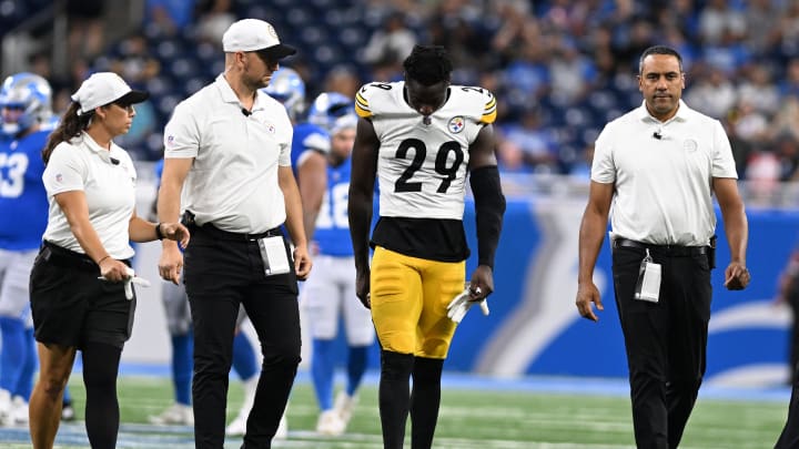 Aug 24, 2024; Detroit, Michigan, USA;  Pittsburgh Steelers cornerback Ryan Watts (29) walks off the field after being injured against the Detroit Lions late in the fourth quarter at Ford Field. Mandatory Credit: Lon Horwedel-USA TODAY Sports