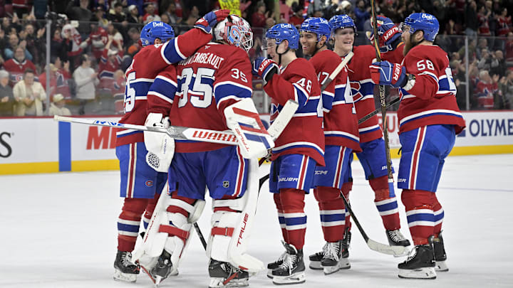 Apr 8, 2025; Montreal, Quebec, CAN; Montreal Canadiens goalie Sam Montembeault (35) celebrates the win against the Detroit Red Wings with teammates at the Bell Centre. Mandatory Credit: Eric Bolte-Imagn Images