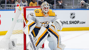Apr 6, 2024; Elmont, New York, USA; Nashville Predators goaltender Kevin Lankinen (32) in action against the New York Islanders during the second period at UBS Arena. Mandatory Credit: Tom Horak-Imagn Images