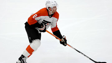 Mar 20, 2025; Washington, District of Columbia, USA; Philadelphia Flyers defenseman Cam York (8) controls the puck during the third period against the Washington Capitals at Capital One Arena. Mandatory Credit: Daniel Kucin Jr.-Imagn Images