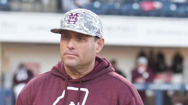 Mississippi State head coach Chris Lemonis listens to the ground rules before the game against Ole Miss at Swayze Field in Oxford, Miss., on Friday, Apr. 12, 2024.