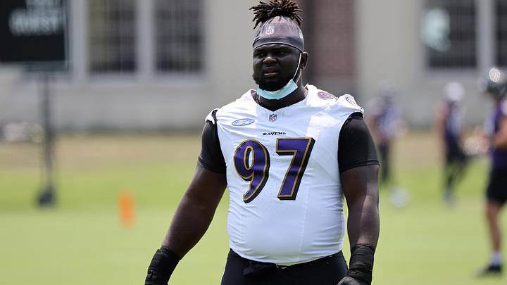 Baltimore Ravens defensive tackle C.J. Okoye looks on during an NFL OTA at Under Armour Performance Center.
