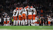 The Cleveland Browns huddle against the Houston Texans in a 2024 AFC wild card game.