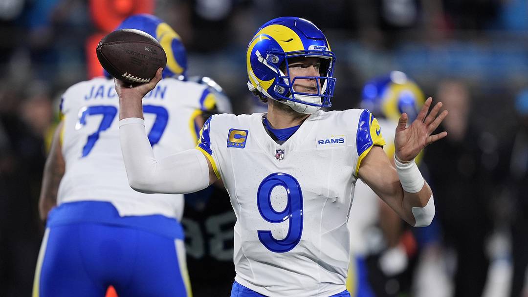 Jan 10, 2026; Charlotte, NC, USA; Los Angeles Rams quarterback Matthew Stafford (9) drops back to pass against the Carolina Panthers in the first half during the NFC Wild Card Round game at Bank of America Stadium. Mandatory Credit: Jim Dedmon-Imagn Images