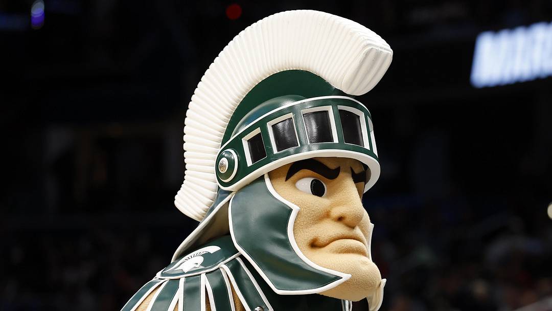 Mar 27, 2026; Washington, DC, USA; The Michigan State Spartans mascot perform in the first half during a Sweet Sixteen game of the East Regional of the men's 2026 NCAA Tournament at Capital One Arena. Mandatory Credit: Geoff Burke-Imagn Images Mar 27, 2026; Washington, DC, USA; The Michigan State Spartans mascot perform in the first half during a Sweet Sixteen game of the East Regional of the men's 2026 NCAA Tournament at Capital One Arena. Mandatory Credit: Geoff Burke-Imagn Images