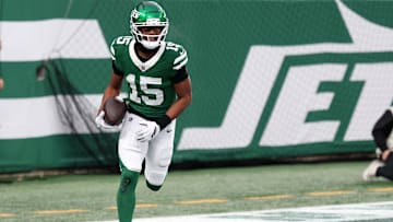 Nov 30, 2025; East Rutherford, New Jersey, USA;New York Jets wide receiver Adonai Mitchell (15) reacts after a touchdown catch against the Atlanta Falcons during the second half at MetLife Stadium. Mandatory Credit: Vincent Carchietta-Imagn Images