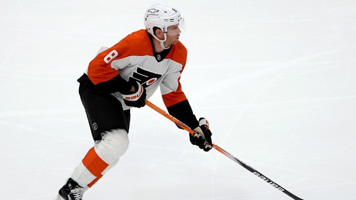 Mar 20, 2025; Washington, District of Columbia, USA; Philadelphia Flyers defenseman Cam York (8) controls the puck during the third period against the Washington Capitals at Capital One Arena. Mandatory Credit: Daniel Kucin Jr.-Imagn Images