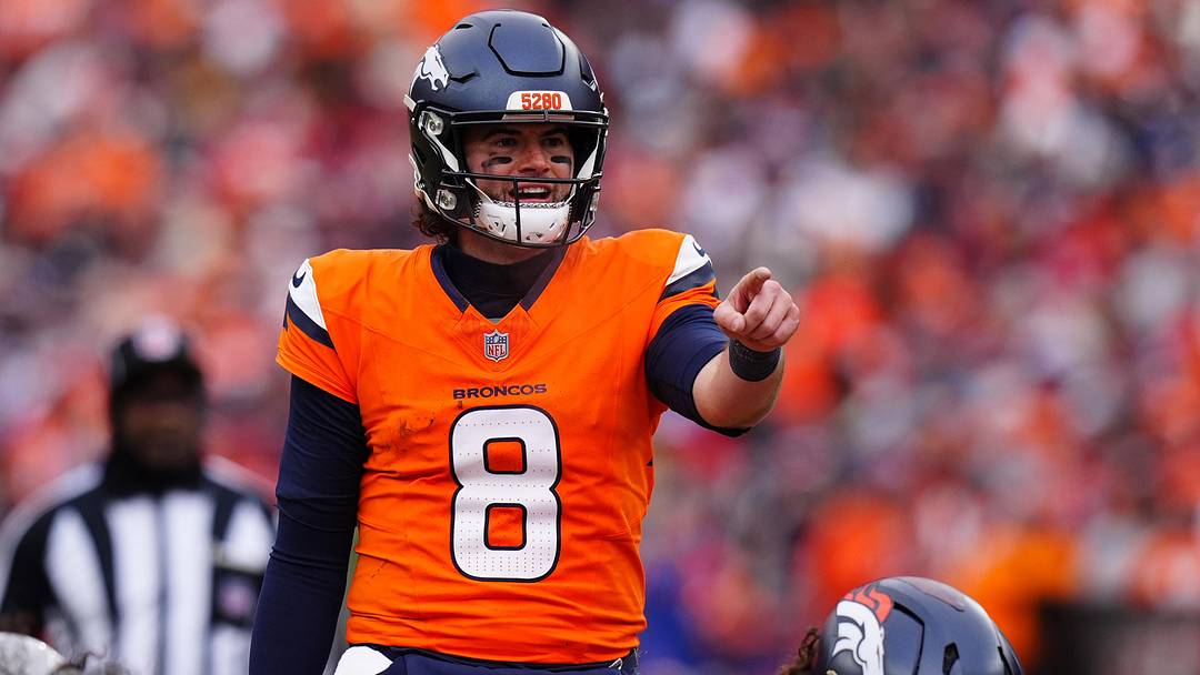 Jan 25, 2026; Denver, CO, USA; Denver Broncos quarterback Jarrett Stidham (8) reacts during the first half in the 2026 AFC Championship Game at Empower Field at Mile High. 