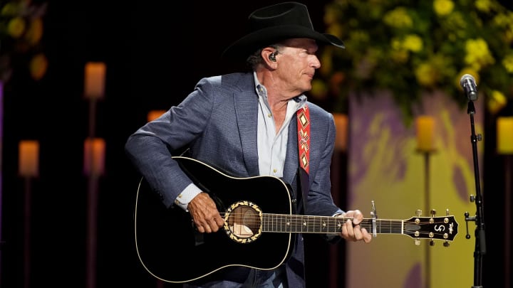 Oct 30, 2022; Nashville, TN, USA; George Strait performs during a "Coal Miner's Daughter: A Celebration of the Life & Music of Loretta Lynn" memorial concert at Grand Ole Opry House.