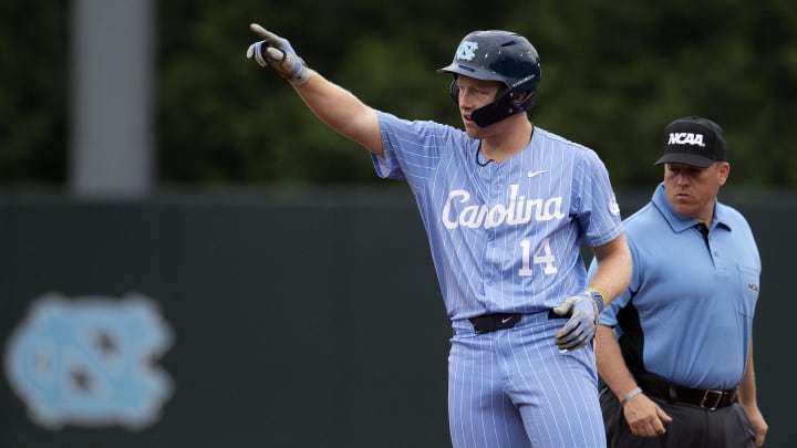 Jun 2, 2024; Chapel Hill, NC, USA;  North Carolina Tar Heels infielder Parks Harber (14) reacts to getting a base hit against the Louisiana State Tigers in the sixth inning of the Div. I NCAA baseball regional at Boshamer Stadium.  Mandatory Credit: Jeffrey Camarati-USA TODAY Sports
