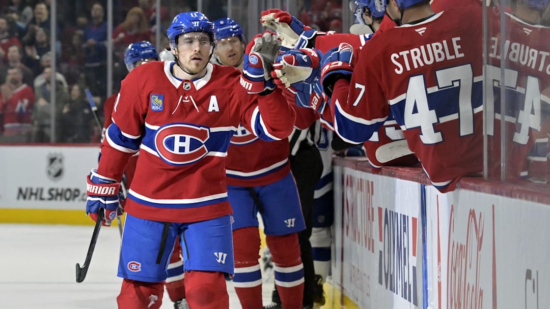 Feb 9, 2025; Montreal, Quebec, CAN; Montreal Canadiens forward Brendan Gallagher (11) celebrates with teammates after scoring a goal against the Tampa Bay Lightning during the third period at the Bell Centre. Mandatory Credit: Eric Bolte-Imagn Images