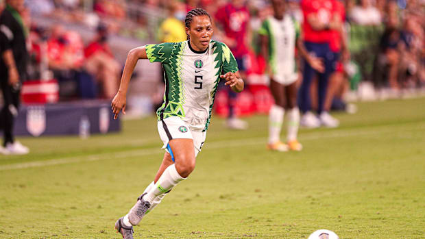 Nigeria's Onome Ebi runs after the ball in a 2-0  defeat to the USA at the new Q2 Stadium. 