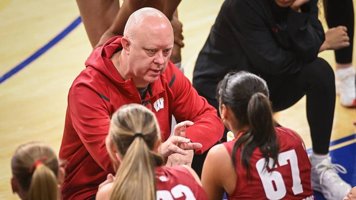 Wisconsin coach Kelly Sheffield talks to players during a timeout in a spring match against Marquette on Monday, March 23, 2026, at the Al McGuire Center in Milwaukee, Wisconsin.