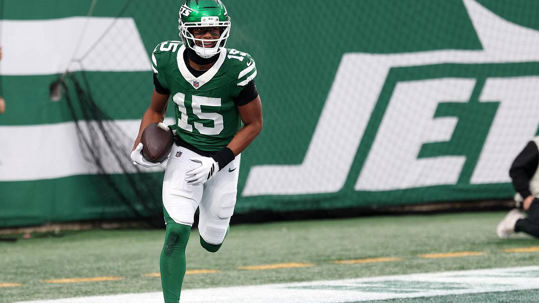 Nov 30, 2025; East Rutherford, New Jersey, USA;New York Jets wide receiver Adonai Mitchell (15) reacts after a touchdown catch against the Atlanta Falcons during the second half at MetLife Stadium. Mandatory Credit: Vincent Carchietta-Imagn Images Nov 30, 2025; East Rutherford, New Jersey, USA;New York Jets wide receiver Adonai Mitchell (15) reacts after a touchdown catch against the Atlanta Falcons during the second half at MetLife Stadium. Mandatory Credit: Vincent Carchietta-Imagn Images