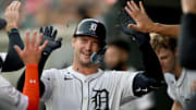 Jul 28, 2025; Detroit, Michigan, USA; Detroit Tigers catcher Dillon Dingler (13) gets showered with sunflower seeds as he celebrates with his teammates in the dugout after hitting a solo home run against the Arizona Diamondbacks in the sixth inning at Comerica Park. 