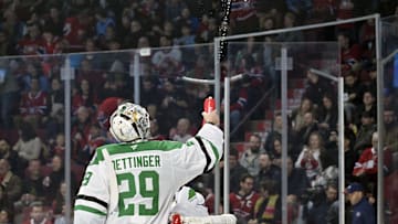 Jan 11, 2025; Montreal, Quebec, CAN; Dallas Stars goalie Jake Oettinger (29) squirts his water bottle during the first period of a game against the Montreal Canadiens at the Bell Centre. Mandatory Credit: Eric Bolte-Imagn Images