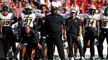Missouri Tigers players and coaches watch from the sideline, in a game versus SEC Conference rival Alabama Crimson Tide last season.
