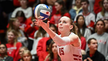 Wisconsin outside hitter Mimi Colyer (15) serves against Marquette in a spring match Wednesday, April 16, 2025, at the UW Field House in Madison, Wisconsin.