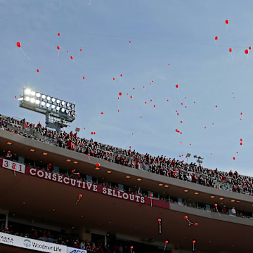 Nebraska Cornhuskers fans release balloons after their team scored first during Saturday's NCAA Division I football game against the Ohio State Buckeyes at Memorial Stadium in Lincoln, Neb., on November 6, 2021