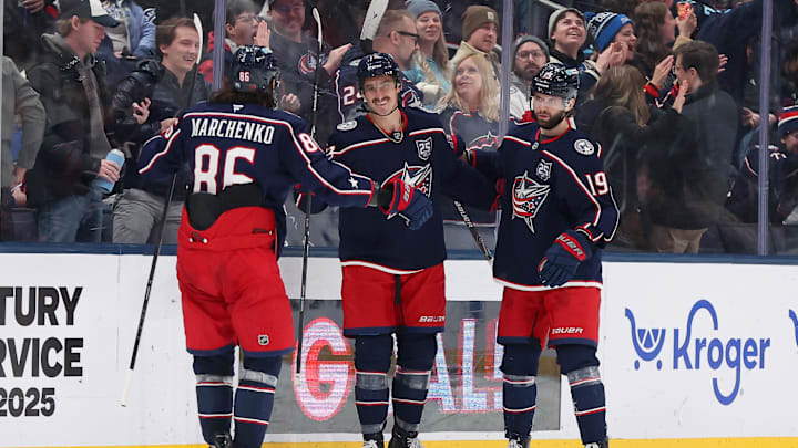 Jan 24, 2026; Columbus, Ohio, USA;  Columbus Blue Jackets left wing Mason Marchment (17) celebrates his third goal of the game with right wing Kirill Marchenko (86) and center Adam Fantilli (19) during the third period against the Tampa Bay Lightning at Nationwide Arena. Mandatory Credit: Joseph Maiorana-Imagn Images