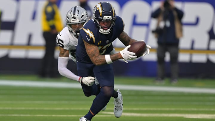 Nov 30, 2025; Inglewood, California, USA; Los Angeles Chargers wide receiver Keenan Allen (13) makes a catch against the Las Vegas Raiders during the first half at SoFi Stadium. Mandatory Credit: Jayne Kamin-Oncea-Imagn Images