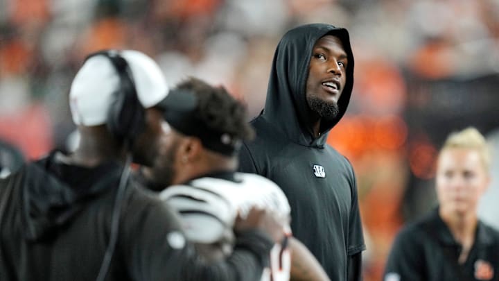 Cincinnati Bengals wide receiver Tee Higgins (5) looks at the scoreboard as his teammates face Indianapolis Colts in during the NFL preseason at Paycor Stadium in Cincinnati on Thursday, Aug. 22, 2024.