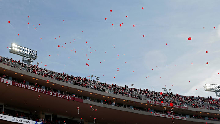 Nebraska Cornhuskers fans release balloons after their team scored first during Saturday's NCAA Division I football game against the Ohio State Buckeyes at Memorial Stadium in Lincoln, Neb., on November 6, 2021