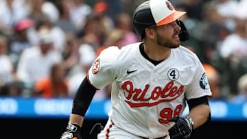 Jun 1, 2025; Baltimore, Maryland, USA; Baltimore Orioles catcher Maverick Handley (98) runs to first during the seventh inning against the Chicago White Sox at Oriole Park at Camden Yards. 