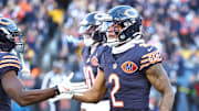 Nov 23, 2025; Chicago, Illinois, USA; Chicago Bears wide receiver DJ Moore (2) reacts after making a touchdown catch against the Pittsburgh Steelers during the second half at Soldier Field. Mandatory Credit: Mike Dinovo-Imagn Images
