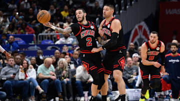 Jan 1, 2025; Washington, District of Columbia, USA; Chicago Bulls guard Lonzo Ball (2) and Chicago Bulls center Nikola Vucevic (9) 